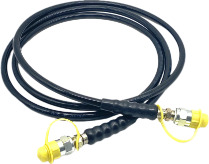 High pressure hydraulic hose with yellow caps.