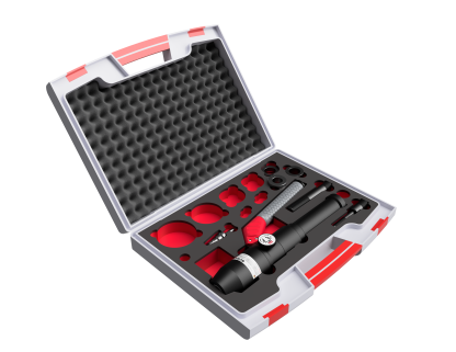 Climbing bolt crimper tool set in a case.